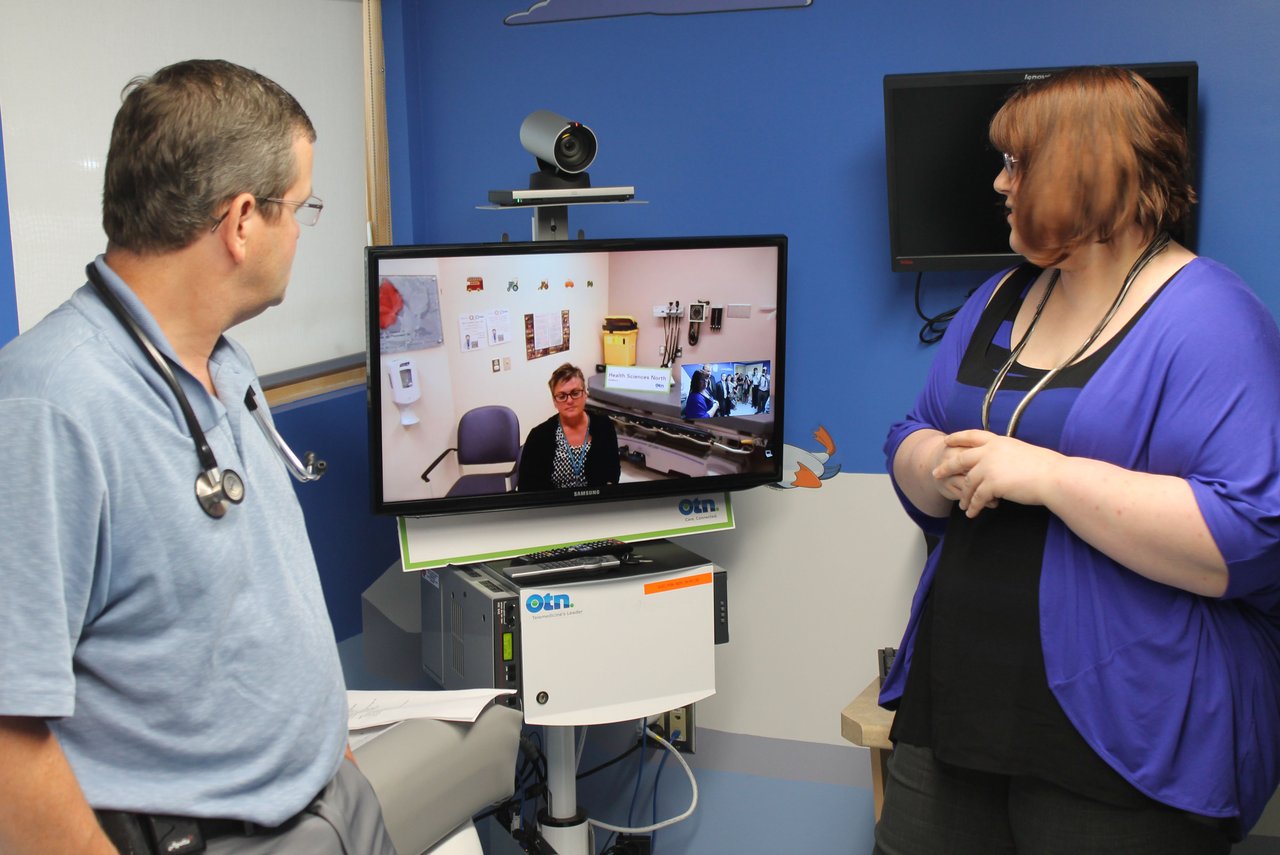 Photo of clinical staff using a hospital telemedicine video system, representing the patient-facing technology systems disrupted by the Luminis Health cyberattack